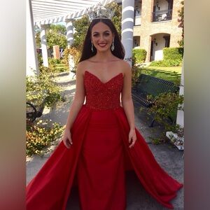 Jovani formal gown with a train, beaded top (shown in picture #3)